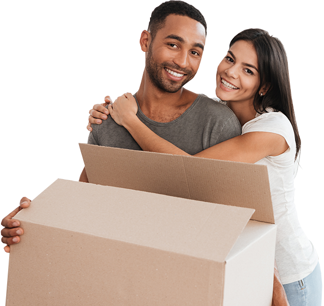 Couple holding a box while posing for a photo